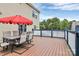 Outdoor wooden deck with furniture offers relaxing retreat at 902 Silverberry St, Gastonia, NC 28054