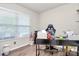 Bright home office featuring a large window, modern desk, and comfortable ergonomic chair at 902 Silverberry St, Gastonia, NC 28054