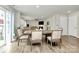This lovely dining space looks into the bright living room with fireplace and comfortable seating at 902 Silverberry St, Gastonia, NC 28054