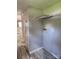 Interior laundry room with neutral paint, washer/dryer hookups, vinyl flooring, and storage shelf at , Salisbury, NC 28146