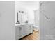Stylish bathroom featuring modern double sink vanity and a luxurious marble tile shower at 104 Spargo St, Gastonia, NC 28056