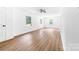 Large bedroom with windows offering generous natural light and new flooring at 104 Spargo St, Gastonia, NC 28056