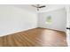 Cozy bedroom boasts natural light, sleek flooring, and serene space for relaxation at 104 Spargo St, Gastonia, NC 28056