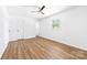 Bright bedroom with hardwood floors, a ceiling fan, and a serene atmosphere at 104 Spargo St, Gastonia, NC 28056
