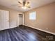 Bedroom featuring an updated ceiling fan, and a closet at 125 Circle Dr, Mount Holly, NC 28120