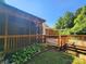 Expansive wooden deck with a covered section perfect for entertaining or relaxing outdoors at 125 Circle Dr, Mount Holly, NC 28120