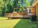 Wooden deck outside the house offers space for outdoor activities and relaxing at 125 Circle Dr, Mount Holly, NC 28120