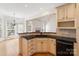Kitchen featuring granite countertops, wooden cabinets, and an open breakfast bar at 1730 Townsend Ln, Rock Hill, SC 29730