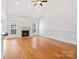 Bright living room featuring a fireplace, hardwood floors, and plenty of natural light at 1730 Townsend Ln, Rock Hill, SC 29730