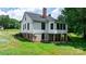 Home exterior showing large backyard, sunroom addition and brick foundation at 2704 Kool Park Ne Rd, Hickory, NC 28601