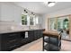 Stylish kitchen features a sink with white countertops, sleek cabinets, and modern fixtures at 2704 Kool Park Ne Rd, Hickory, NC 28601