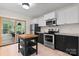 Well-equipped kitchen with stainless steel appliances, modern countertops, and ample cabinet space at 2704 Kool Park Ne Rd, Hickory, NC 28601