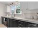 Bright kitchen with modern design and black and white color scheme, featuring ample counter space and cabinets at 2704 Kool Park Ne Rd, Hickory, NC 28601
