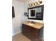 Bathroom with a granite countertop vanity and a framed mirror at 3085 Faith Rd, Salisbury, NC 28146