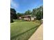 Charming ranch-style home with a well-manicured lawn and inviting front porch at 3085 Faith Rd, Salisbury, NC 28146