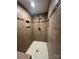 Modern tiled shower with built-in shelving at 3085 Faith Rd, Salisbury, NC 28146