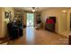 Comfortable den or sitting room with built-in bookshelves and a sliding door to the deck at 506 Hearne Farm Rd, Mount Gilead, NC 27306