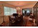 Elegant dining room featuring a chandelier and hardwood floors at 506 Hearne Farm Rd, Mount Gilead, NC 27306