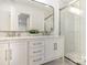 Modern bathroom featuring double vanity, updated fixtures, and glass-enclosed shower at 6639 Camp Creek Rd, Lancaster, SC 29720