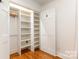 This closet features custom shelving and storage, as well as access to hardwood flooring at 6639 Camp Creek Rd, Lancaster, SC 29720
