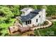Aerial view of a home with a well-maintained deck and landscaped yard at 6639 Camp Creek Rd, Lancaster, SC 29720