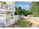 Spacious backyard featuring a patio, trampoline, storage shed, and lush green lawn at 6930 Culloden More Ct, Charlotte, NC 28217