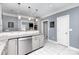 Kitchen features granite countertops, stainless steel dishwasher, pendant lighting, and open layout at 6930 Culloden More Ct, Charlotte, NC 28217