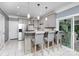 Stylish kitchen with gray cabinets, granite countertops, and stainless steel appliances at 6930 Culloden More Ct, Charlotte, NC 28217
