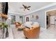 Bright living room with a stone fireplace, neutral decor, and an inviting seating area at 6930 Culloden More Ct, Charlotte, NC 28217