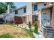 Brick patio in backyard with trimmed green trees and white rock garden at 709 21St Ne Ave, Hickory, NC 28601