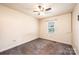 Bedroom featuring neutral paint, carpet, a window, and a ceiling fan at 709 21St Ne Ave, Hickory, NC 28601