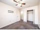 Bedroom with neutral paint, carpet, a ceiling fan and a closet at 709 21St Ne Ave, Hickory, NC 28601
