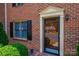Close up of townhome brick facade and front door entrance at 709 21St Ne Ave, Hickory, NC 28601