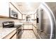 Well-equipped kitchen featuring modern appliances, granite countertops, and ample cabinet space for storage at 709 21St Ne Ave, Hickory, NC 28601