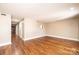 Living room features hardwood floors and access to other rooms of the house at 709 21St Ne Ave, Hickory, NC 28601