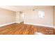 The living room features hardwood floors and a pass-through to the kitchen at 709 21St Ne Ave, Hickory, NC 28601