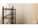 A small room features a metal shelf for storage at 709 21St Ne Ave, Hickory, NC 28601