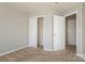 Neutral bedroom featuring a double door closet for ample storage at 8351 Rolling Meadows Ln, Huntersville, NC 28078