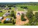 Expansive aerial shot shows new construction homes with large lots and wooded backdrop at 1019 S Main St, Granite Quarry, NC 28146