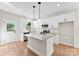 Stylish kitchen with granite countertops, an island, and stainless steel appliances at 1019 S Main St, Granite Quarry, NC 28146