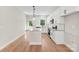 Modern kitchen with stainless steel appliances, granite counters, and a stylish kitchen island at 1019 S Main St, Granite Quarry, NC 28146