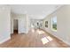 Inviting living area with modern finishes, light-filled windows, and wood-look flooring at 1019 S Main St, Granite Quarry, NC 28146