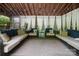 Relaxing gazebo featuring cushioned seating, privacy curtains, and views of the surrounding landscape at 12101 Ranburne Rd, Mint Hill, NC 28227