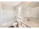 Bathroom showcasing a bathtub and shower combination plus a white sink and vanity at 149 Astor St, Troutman, NC 28166