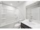 Clean bathroom featuring a shower-tub, white toilet, a sink, and a vanity with modern fixtures at 2040 Dornoch Rd, Tega Cay, SC 29708