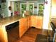 Bright kitchen showcasing wooden cabinets, granite countertops, and modern appliances at 257 Rolling View Dr, New London, NC 28127