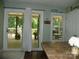 Kitchen featuring granite countertops and sliding glass doors to the outside deck at 257 Rolling View Dr, New London, NC 28127