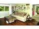 Cozy living room featuring hardwood floors, lots of natural light, and modern decor at 257 Rolling View Dr, New London, NC 28127
