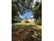 Backyard of home featuring a wooden deck surrounded by lush trees and greenery at 268 Hatley Ne Cir, Concord, NC 28025