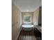 Bathroom featuring a soaking tub and decorative window at 268 Hatley Ne Cir, Concord, NC 28025